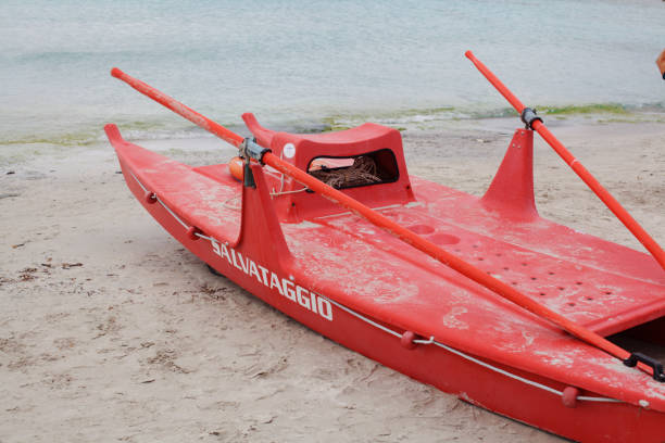 Red rescue boat on the beach