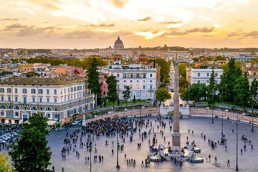 A sunset sky over Piazza del Popolo seen from the Pincio Gardens in the heart of Rome