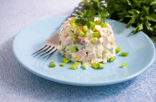 istock traditional olivier salad in a dish 1352082100
