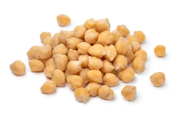 Photo of Heap of fresh cooked chickpeas on white background