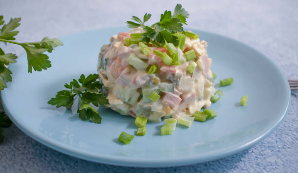 istock traditional olivier salad in a dish 1352083591