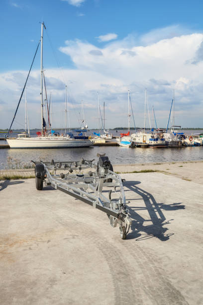 istock Boat trailer at a marina on a sunny day. 1352085269