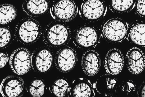istock black and white vintage wall clock background 1352088574