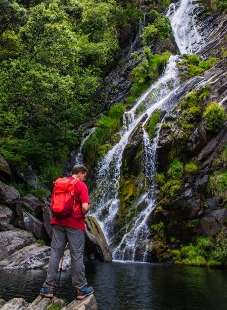 istock Rear View Of A Man Hiking. 1352089448