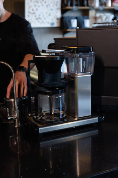 istock Coffee maker with glass jug of coffee. filter coffee machine. alternative coffee making 1352090230