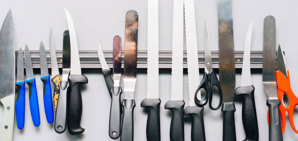 istock Photo of different many knifes in kitchen 1352091828
