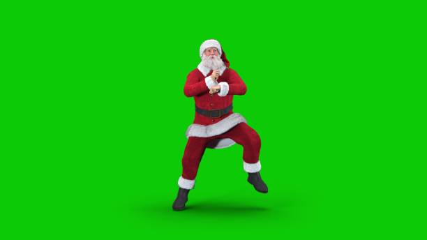Santa Claus dances k-pop happy energetic dance and jumps funny and high stock photo