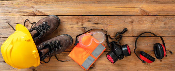 istock Work health and safety flat lay. Labor personal protective gear for industry and construction site. 1352092985
