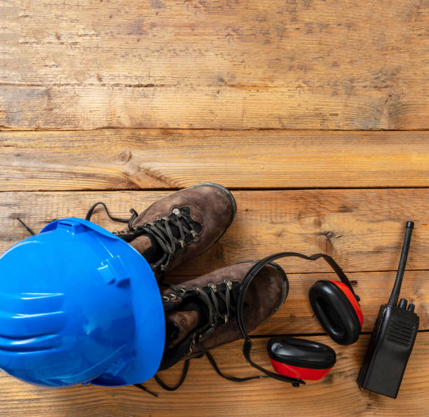 istock Work safety, labor personal protective gear on wood. Industry and construction site equipment.. 1352092989