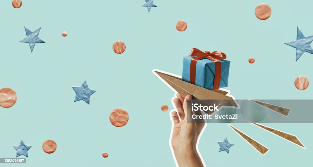 Online shopping concept, gift delivery. Art collage. Paper airplane with gift box. Online shopping concept, gift delivery. Gift Stock Photo