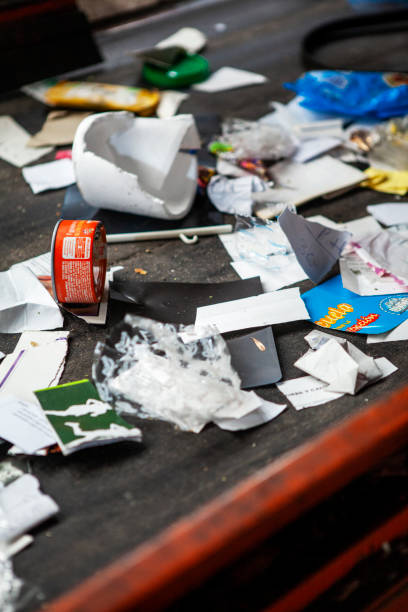 istock Aluminum, plastic and paper waste on conveyor belt 1352094738