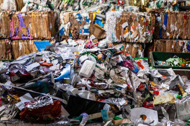 istock Mound of plastic, paper and carton waste 1352094756