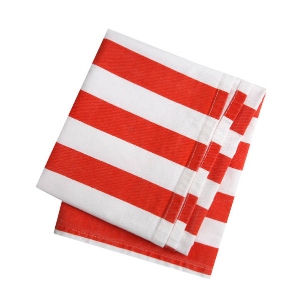 istock Folded red and white dischcloth isolated. Christmas fodd decor cloth. Kitchen towel. 1352095011
