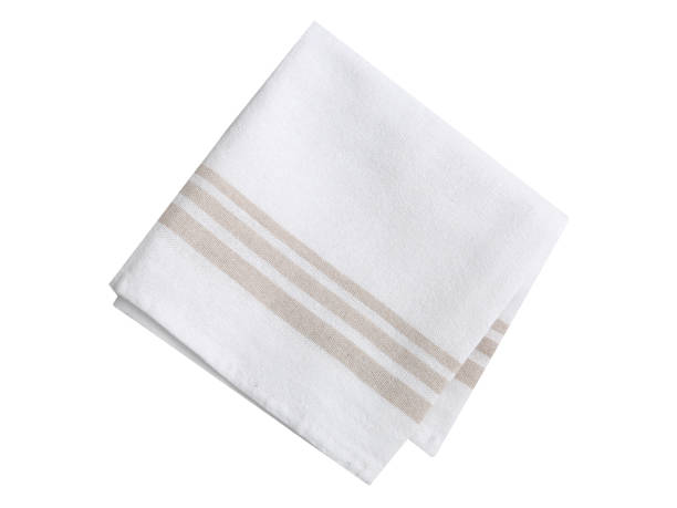 istock White folded square napkin, kitchen clothisolated. Light towel Food design element. Dshcloth. 1352095692