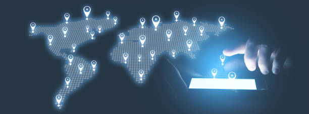 Male hands holding smartphone. World map with a GPS navigation