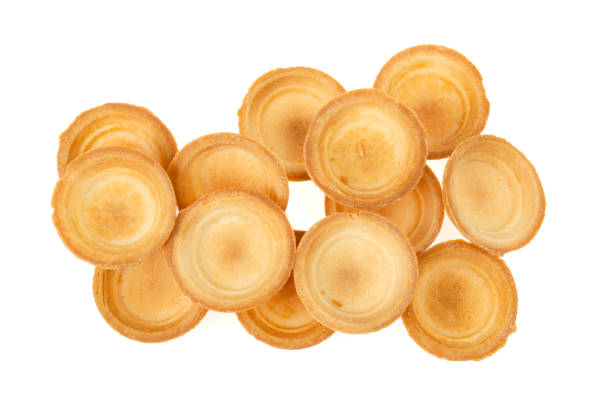 istock Empty sand tartlets isolated on white. Studio Photo 1352099974