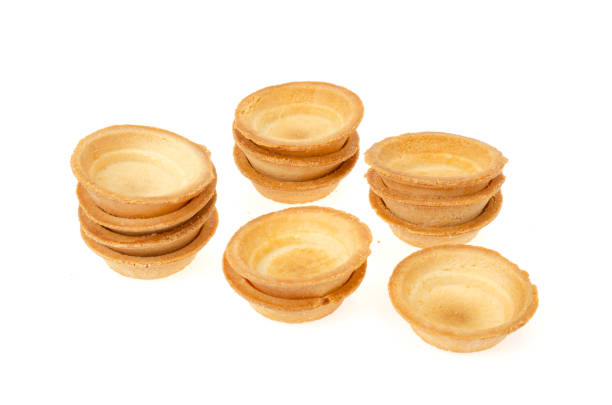 istock Empty sand tartlets isolated on white. Studio Photo 1352099983