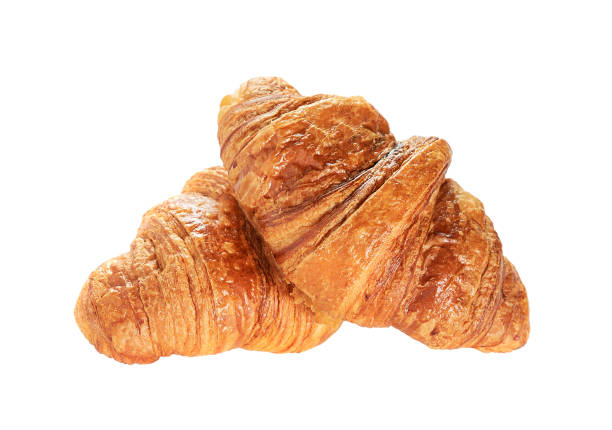 istock Two French croissants isolated on white background. 1352100630