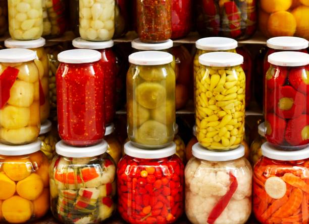 istock Organic preserved vegetable in a glass jars. 1352103309
