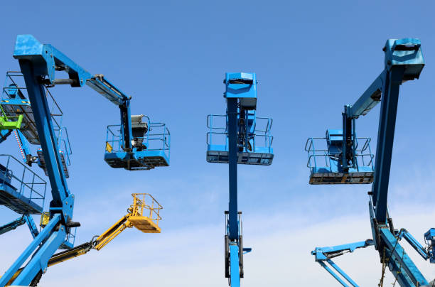 istock Back of aerial working platforms of cherry picker. 1352105218