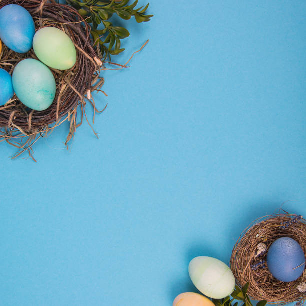 istock Colorful background with Easter eggs on blue background. Happy Easter concept. Can be used as poster, background, holiday card 1352110641