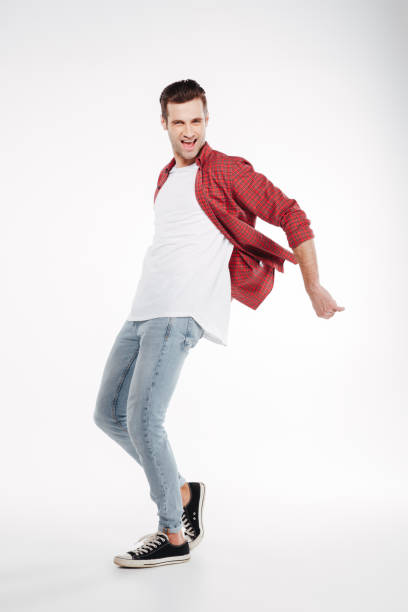 istock Full length portrait of happy man 1352111487