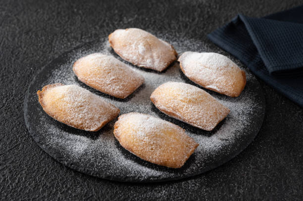istock Madeleines - French small sponge cakes 1352111883