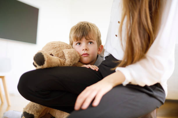 istock six year old boy with mom 1352112999
