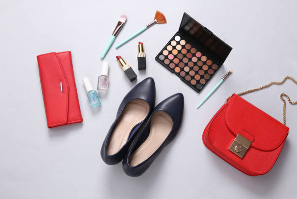istock Flat lay composition of female accessories, cosmetics on white background. Top view 1352114967
