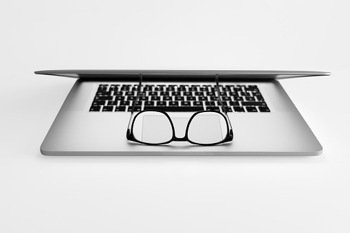 Glasses on Laptop (with clipping path)