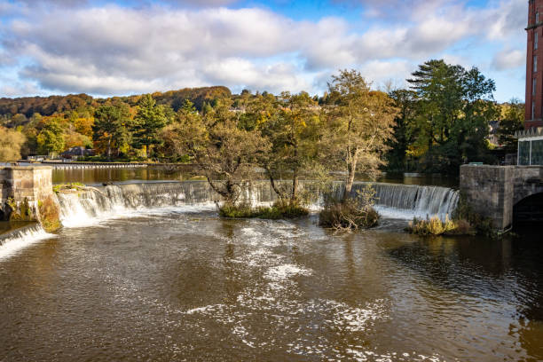 istock Horseshoe Weir at Belper Mill on Bridge Foot in Derbyshire, England 1352122749