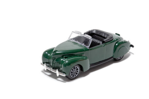 istock Dark green vintage car isolated on white background 1352125020