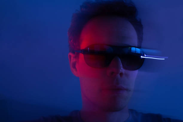 istock male model portrait in neon light 1352129859