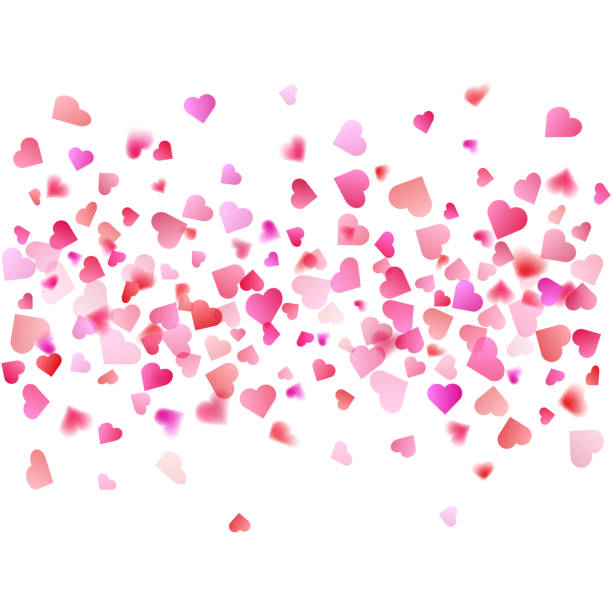 istock Pink particles heart shape. Valentines Day background of hearts falling. Element for greeting cards 1352130144