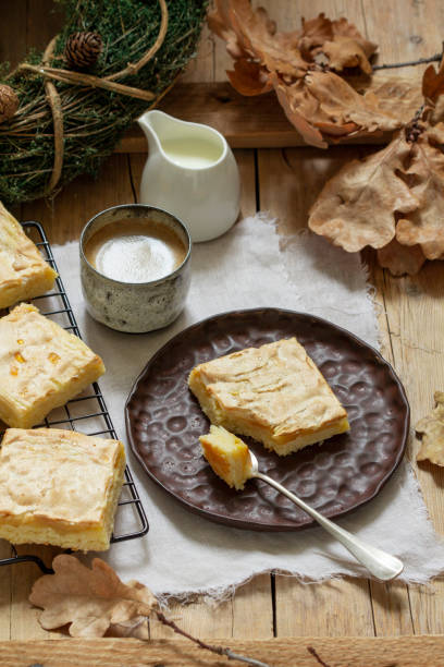 istock Apple pie slices with meringue served with coffee. Rustic style. 1352132660