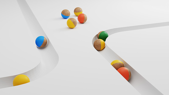 3D Render of marble balls with various colors and wood on white track