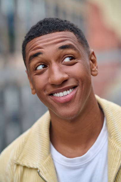 istock Headshot of a smiling handsome young man 1352133978