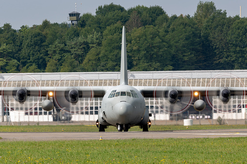 Payerne, Switzerland - September 4, 2014: United Arab Emirates Air Force Lockheed C-130 Hercules military transport aircraft taxiing at Payerne Airport.
