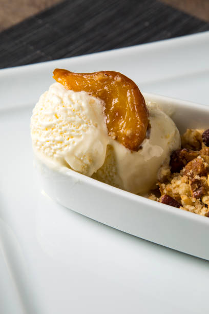 istock Refreshing peach ice cream in a glass close up 1352136083