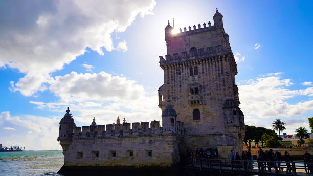 belem tower at sunset in lisbon, portugal - pastel de nata ilustrações imagens e fotografias de stock