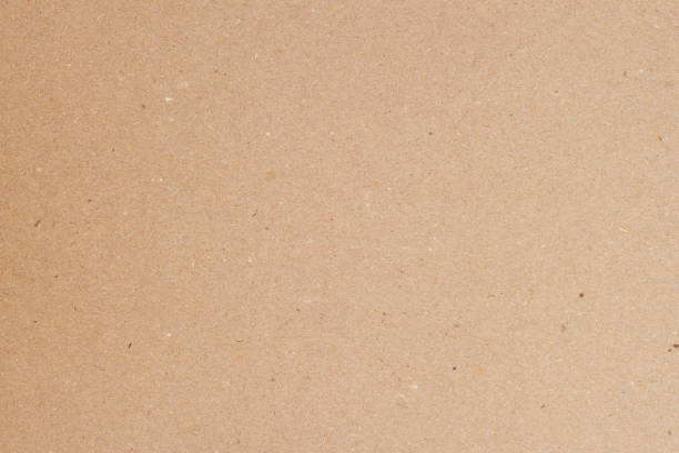 istock Paper, cardboard background close-up. Ecological paper surface texture 1352140937