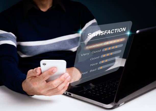 istock A man uses his smartphone to select a 5 star emoticon to display on the virtual screen. A survey, poll, or questionnaire designed to gather information about user experience or customer satisfaction. 1352149672