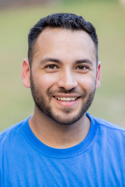 istock Portrait of Young Attractive  Man smiling 1352151189
