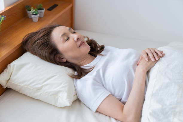 istock senior age woman who sleeps 1352154006