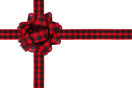 Christmas gift bow and ribbon with red and black buffalo plaid pattern. Box shape isolated on a white background.