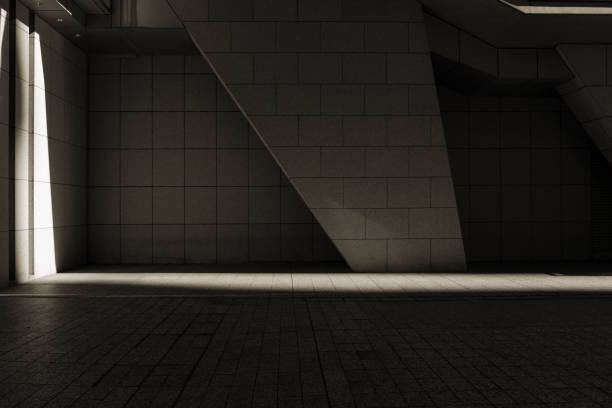 istock Abstract empty dark concrete with Line of light 1352158375