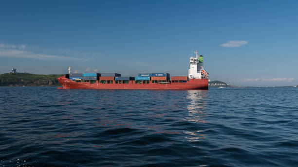 Cargo container ship passes the sea. stock photo