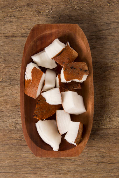 istock Fresh coconut on wooden background 1352163277