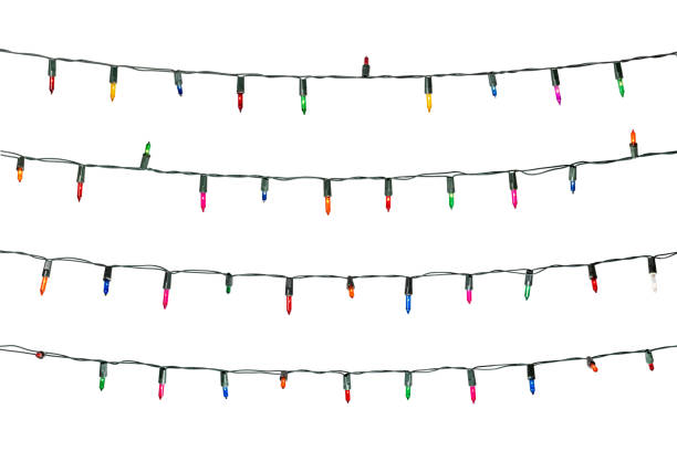 Christmas lights isolated on white background Christmas lights isolated on white background fairy lights stock pictures, royalty-free photos & images