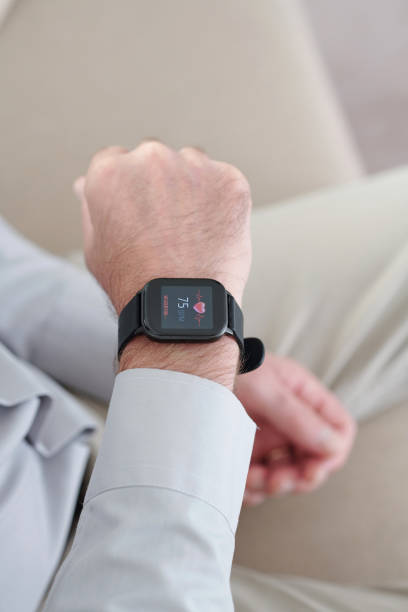 istock Mature Man Checking Heart Rate 1352168883